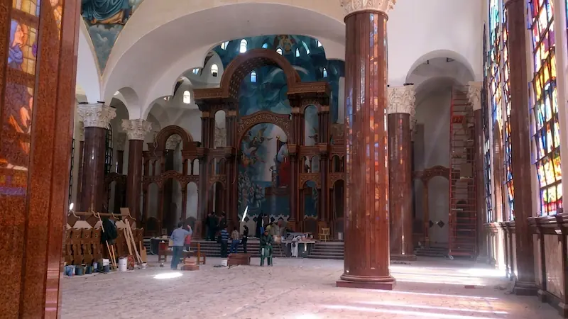 Saint Athanasius Coptic Orthodox Church interior, Alexandria, Egypt — professional audio system installation in a highly reverberant domed sanctuary